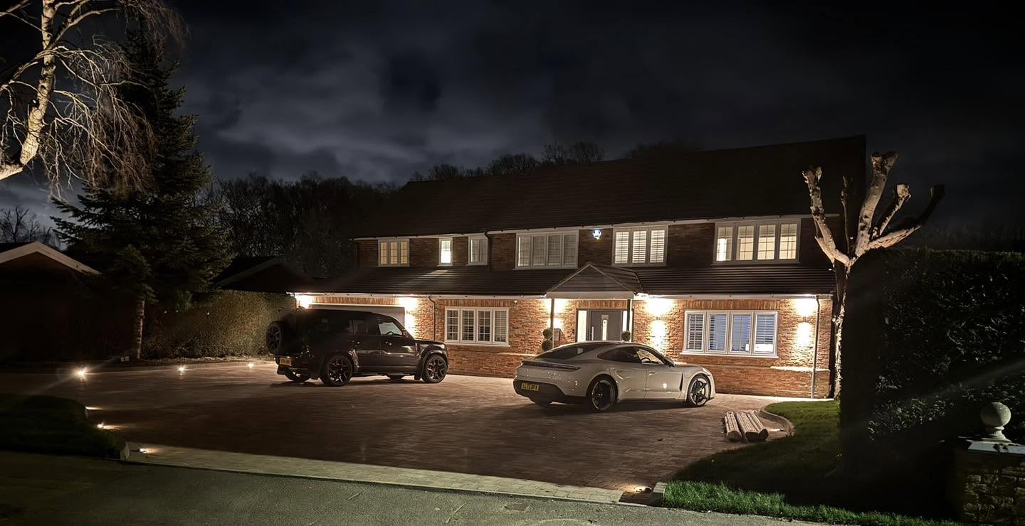 Completed driveway with lighting at night